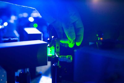 Quantum,Optics,-,Hand,Of,A,Researcher,Adjusting,A,Laser