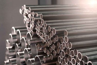 Stainless,Steel,Pipes,In,An,Industrial,Warehouse Stainless,Steel,Pipes,In,An,Industrial,Warehouse